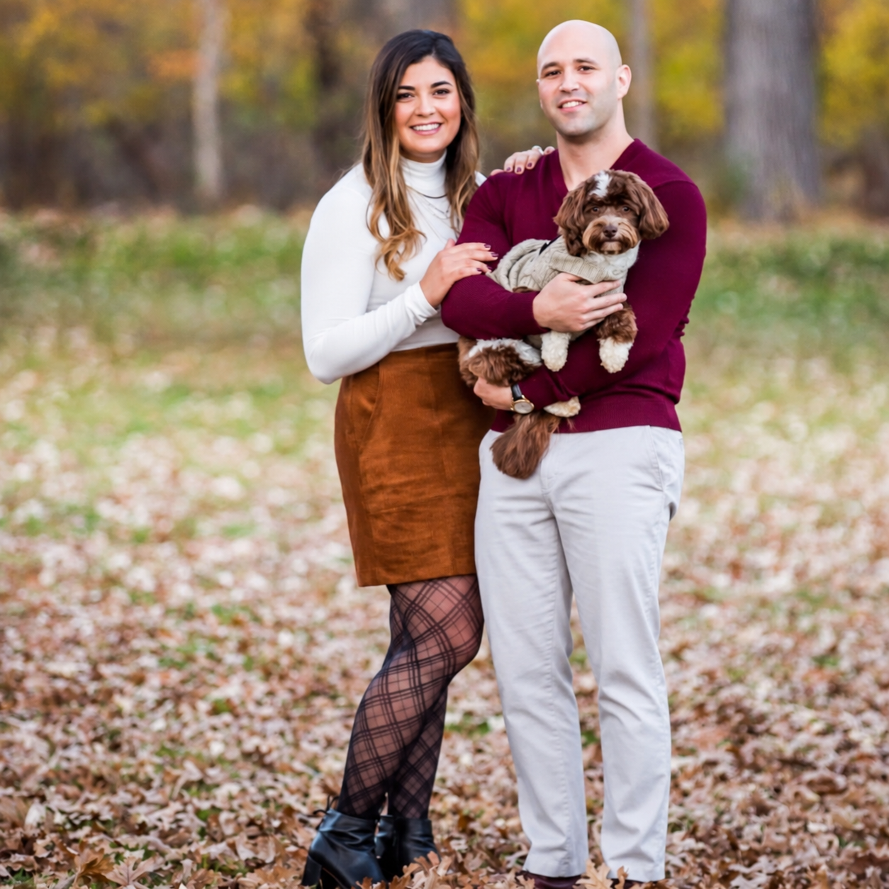Brenden and Brittany, owners of Sixteen Chairs, with their dog
